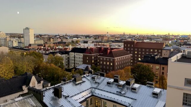 Moon Rising Over Helsinki Rooftops in Kallio at Sunset