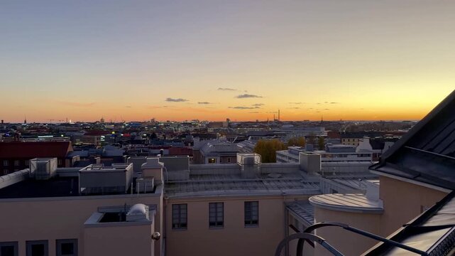 Wide Helsinki Skyline from a Rooftop Terrace at Golden Hour