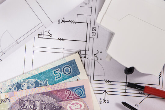 Electrical components using in electric installations, construction diagrams, work tools and polish currency banknotes. Planning build or buy house