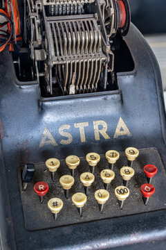 PRAGUE, CZECHIA, AUG 10 2022, Detail of a vintage Astra mechanical adding machine keyboard and internal calculatio