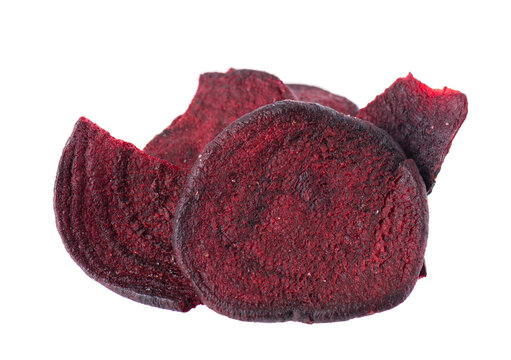 Crispy roasted beetroot chips with sea salt, isolated on white background. Healthy and crunchy natural vegetable snack. Clipping path.