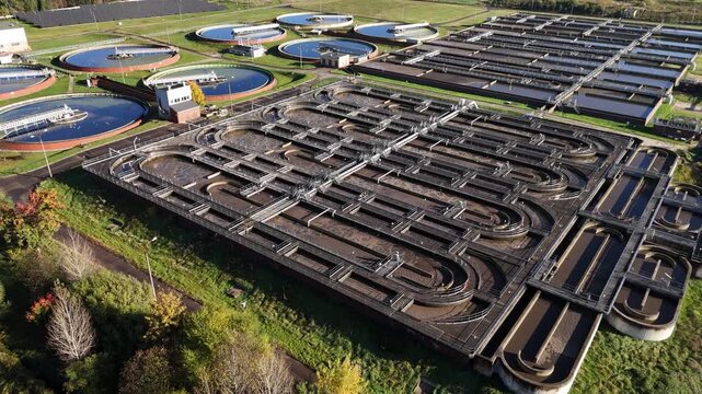Aerial view of wastewater treatment plant clarifiers and aeration water purification tanks
