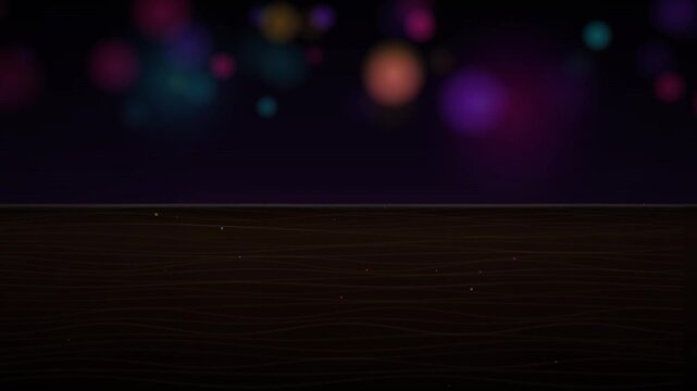 Dark wood table surface with festive colorful bokeh lights background