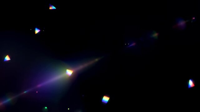 Scattered Prismatic Rainbow Lens Flares on Black Background