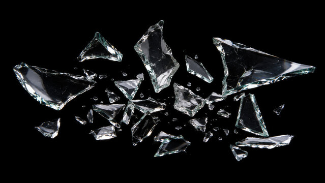 Glass shards on black background, scattered broken glass pieces with sharp edges catching light, shattered glass overlay