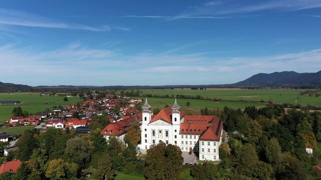 Aerial view, flight at Schlehdorf monastery with parish church St. Tertulin on Kochelsee, Schlehdorf Upper Bavaria, Bavaria, Germany