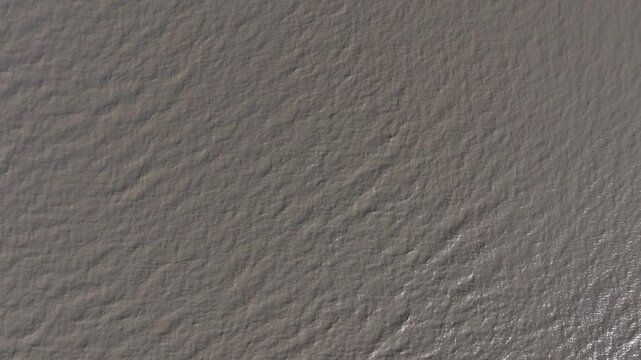 close up of gray cement wall texture with rough surface details