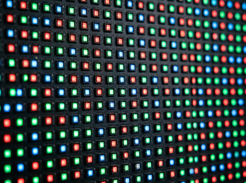 Extreme macro of glowing RGB LED SMD screen matrix digital display