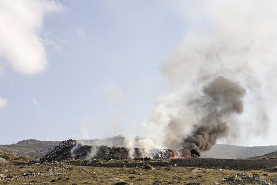 Garbage burning, Mykonos, Greece, Europe