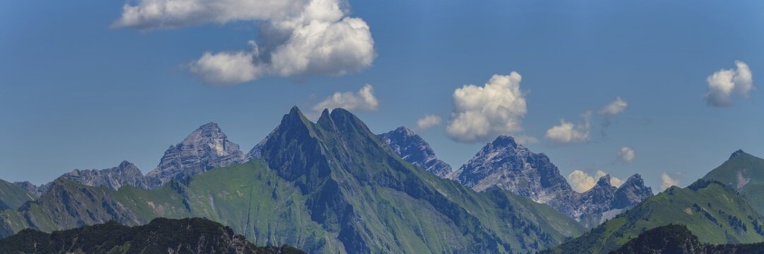 Summer in the Alps, mountain panorama from Fellhorn 2037 m, of the green grassy H&ouml;fats, 2259 m, Hochvogel in the back left, 2592 m, and on the right Kleiner Wilder, 2306 m, Allg&auml;u Alps, Bavaria, Germany