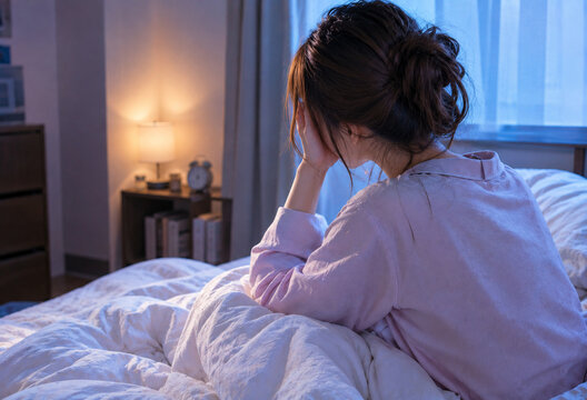 眠れなくて困る女性