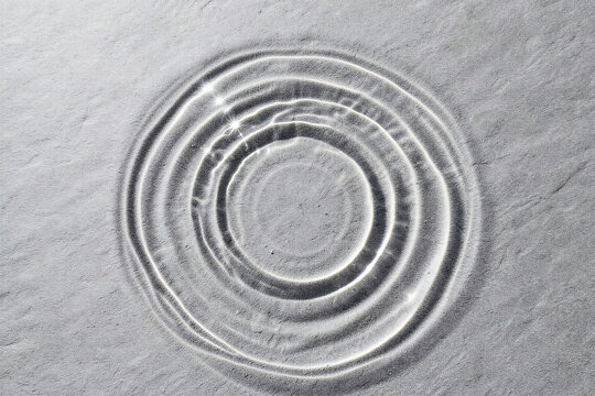 Minimalist Concentric Water Ripple On Gray Slate Macro Flat Lay Texture