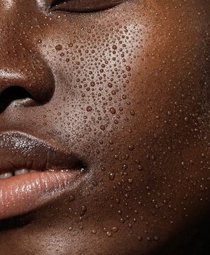ater Droplets on Dark Skin in Skincare Beauty Close Up