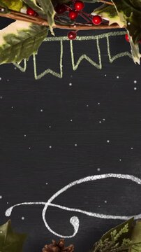 Vertical video: Greens sliding in, holly-pinecone forming, chalk drawing, snowing for card, fading