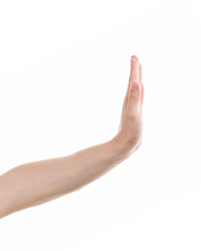 Young adult man hand stop gesture isolated on white
