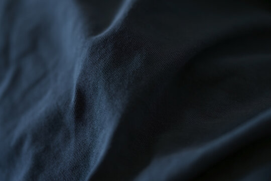 Closeup of dark blue cotton fabric for clothing