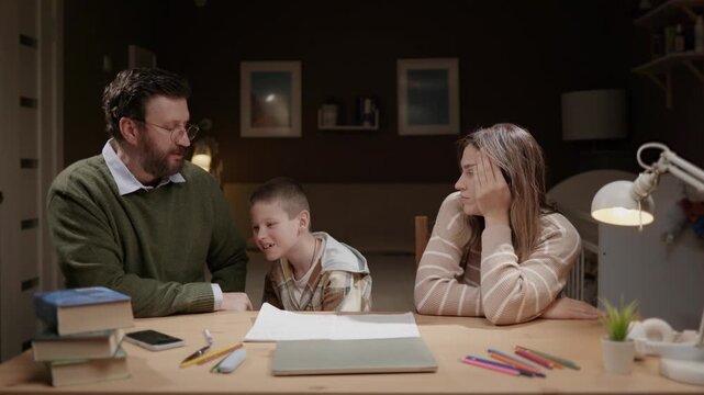 Father and mother scold child while child does homework at home. Strict parents scold child during school homework. Parenting discipline academic stress family conflict concept