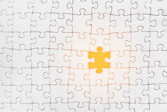White jigsaw puzzles, with one missing piece. Business, idea, teamwork concepts