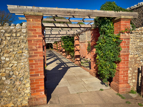Red Brick Pergola Walkway and Stone Archway in Connaught Gardens, Sidmouth, Devon