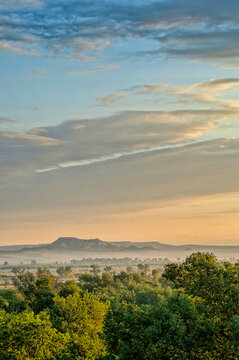West Texas Landscape at Sunrise Featuring Clouds, Mesa, Fog, and Trees