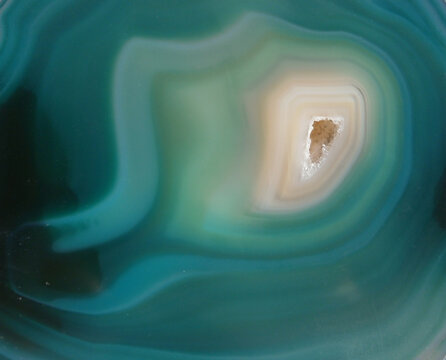 Teal turquoise agate geode slice texture with crystal core