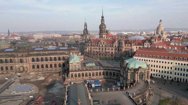 Historic Dresden Germany aerial view showcasing the stunning city center landmarks Dresden Castle Zwinger Palace Hofkirche and Frauenkirche under a clear sky drone flight