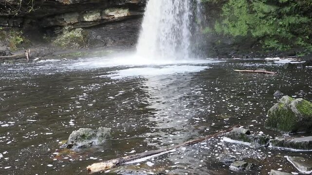 Lady Falls waterfall (Sgwd Gwladys) along the Elidir Trail in South Wales UK, featuring cascading water into a natural pool, waterfalls stock video footage clip