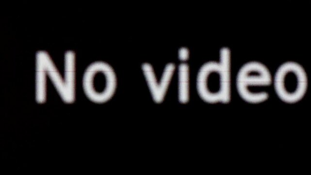 No video caption skips around black frame with glitch effect