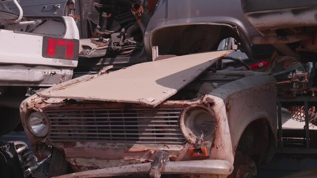 Rusted Antique Classic Car Wreck Abandoned in Auto Scrapyard