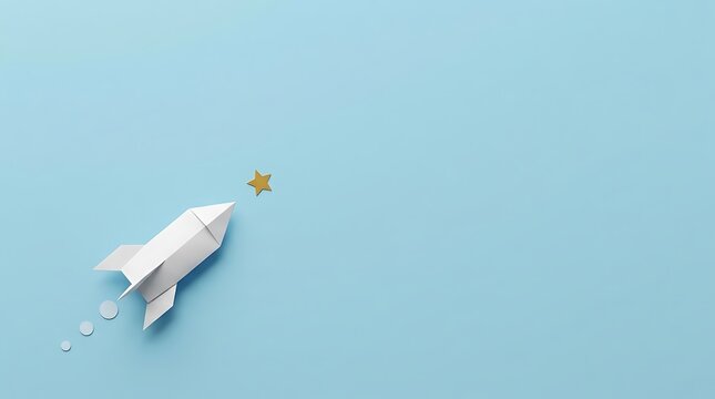 White paper rocket pointing upward toward a gold star on blue background