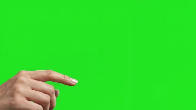 Confident human hand pointing finger touching virtual screen interface gesture isolated over chroma key green background modern connectivity