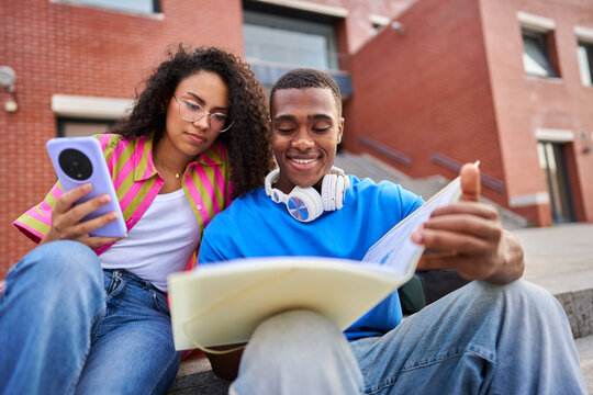Diverse students studying and collaborating on university campus