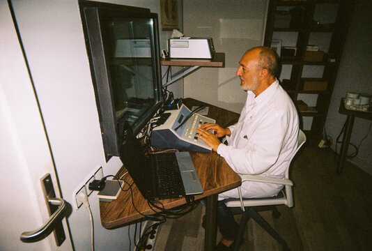 Audiologist Using Medical Equipment