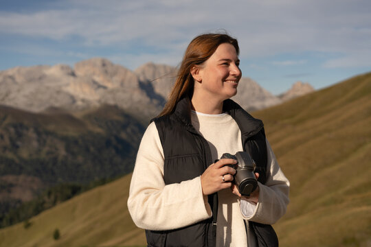 A photographer pauses mid-hike to take in the view