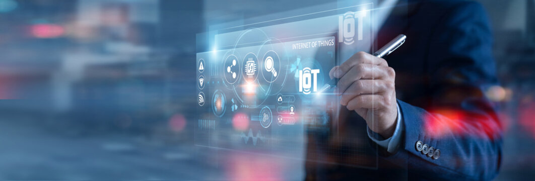 IoT Specialist analyzing IOT on digital screen. monitoring connected devices, collecting data, optimizing networks, improving automation, advancing smart technology