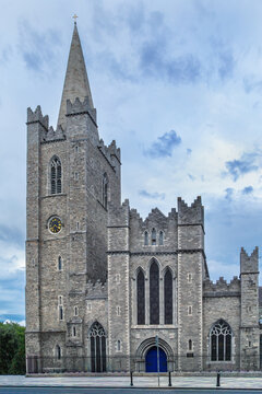 St. Patrick's Cathedral facade in Dublin Ireland. Historic gothic architecture street view under a daytime sky