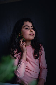 Young Girl Posing with a Fern Leaf in Her Hair, Artistic Child Portrait