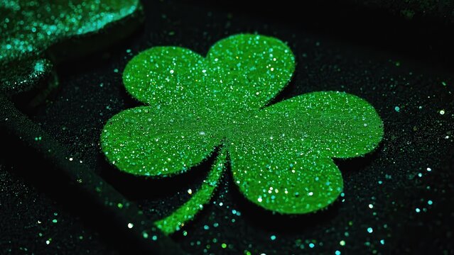 Sparkling Green Shamrock Isolated on Black Background - St. Patrick's Day, Luck, Festive, Holiday, Celebration, Glitter, Close-Up