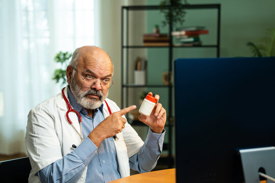 Closeup of Indian Male Doctor Providing Online Medication Guidance