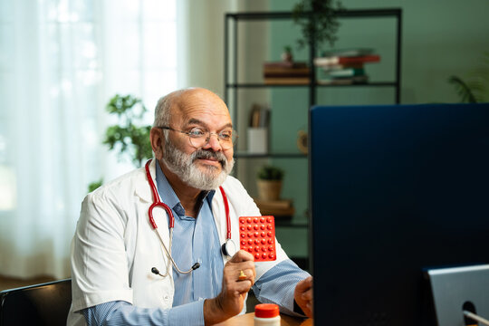Closeup of Indian Male Doctor Providing Online Medication Guidance