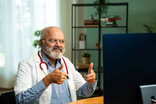 Closeup of Indian Male Doctor Providing Online Medication Guidance