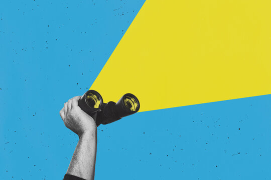 hands holding a big binoculars. Art collage. Searching for information on the internet, planning and analysis concept.