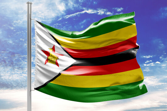 Flag of Zimbabwe Waving in the Wind against a Cloudy Sky