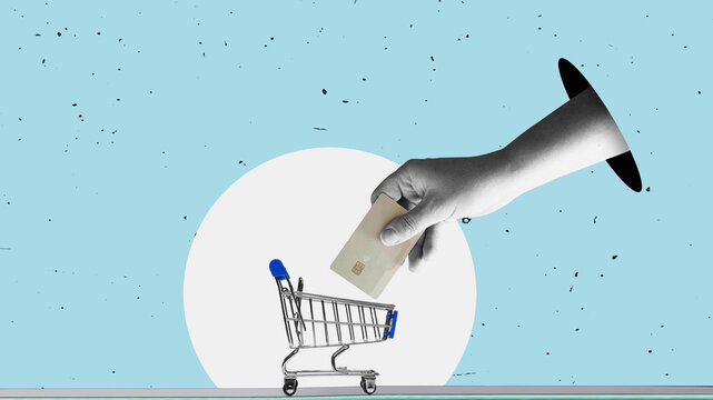  One hand holds shopping cart and aother hand with credit card, purchase with credit card, buy online. Faltat design art.