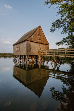 Wooden hut and walkway at blue hour