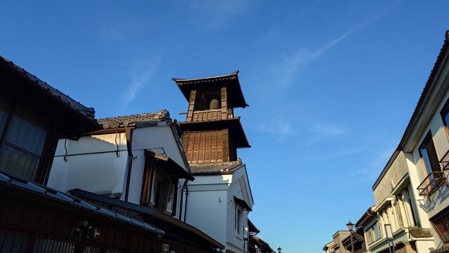 Toki no Kane and white walls under blue sky