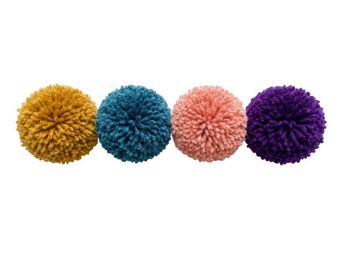 Four colorful yarn pom poms isolated on transparent background