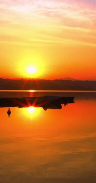The dawn that breathes on the water.