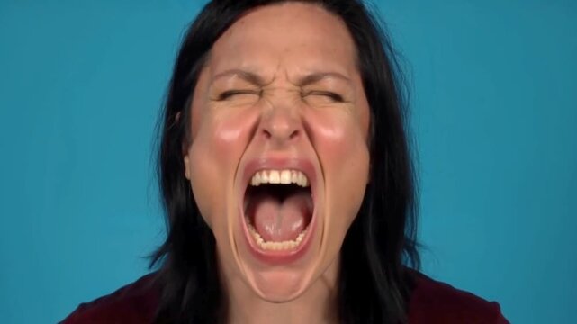 A sudden furious angry outburst and aggressive breakdown of a stressed individual experiencing a severe rage attack and emotional loss of control