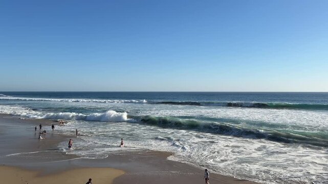 View of Large Ocean Waves at Huntington Beach California in Late Afternoon